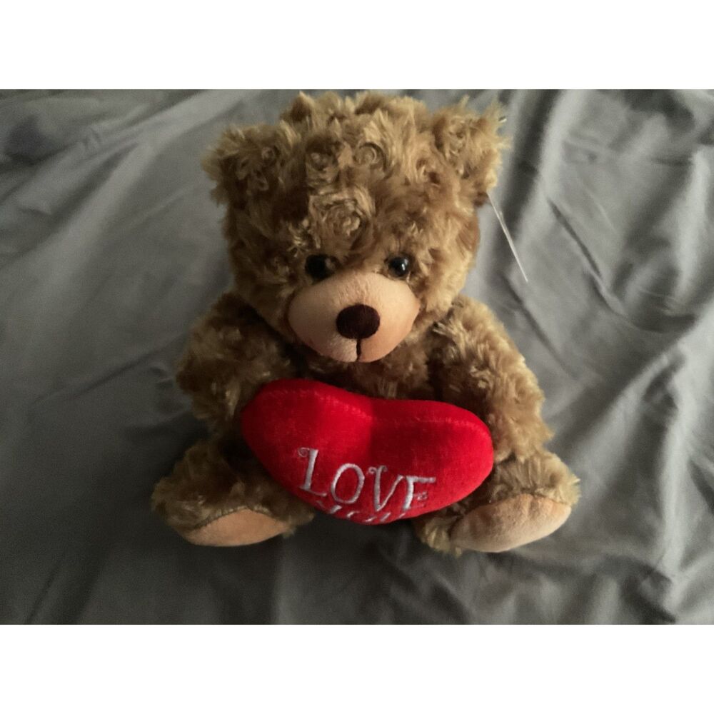 Medium Brown Teddy bear holding Love You Heart